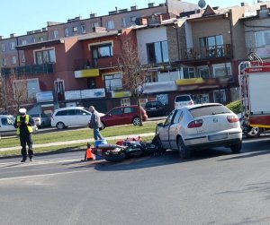 radiowóz na miejscu wypadku motocyklisty